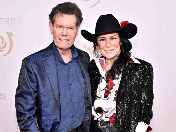 Randy Travis and Mary Davis attend the Kentucky Derby 150 on May 04, 2024 in Louisville, Kentucky. 