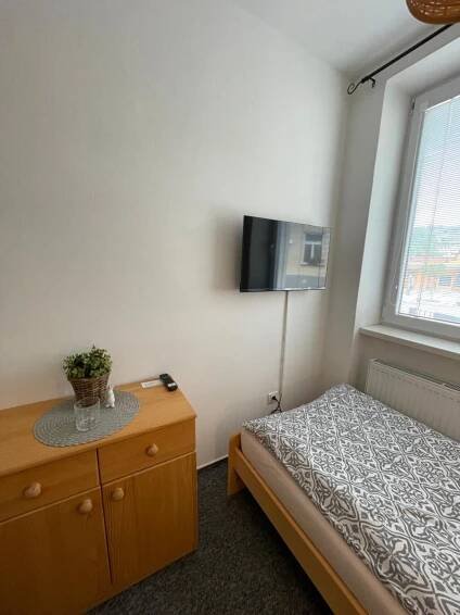 Postel nebo postele na pokoji v ubytování Penzion Ječmínek