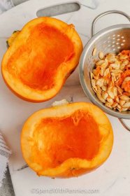 scooped out seeds from pumpkins to make Homemade Pumpkin Puree