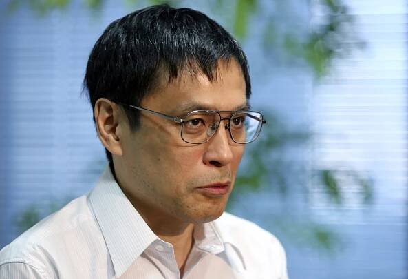 In this July 31, 2015 photo, Takahisa Furukawa, a historian at Nihon University, speaks during an interview with The Associated Press in Tokyo. The four and half minute speech that has reverberated throughout Japan's modern history since it was delivered by Emperor Hirohito at the end of World War II has come back to life in digital form. Hirohito's 