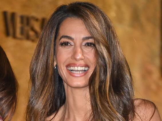 Amal Clooney's balanced diet including pizza and pasta that helps her maintain her killer figure