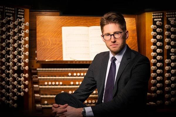 Who is Peter Holder, the sub-organist at Westminster Abbey?