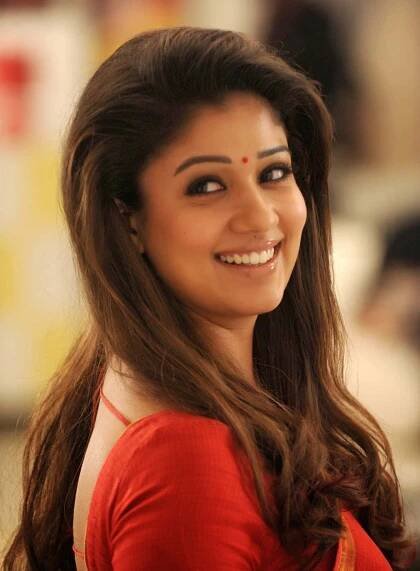 Radiant Indian Actress in Graceful Attire Wallpaper