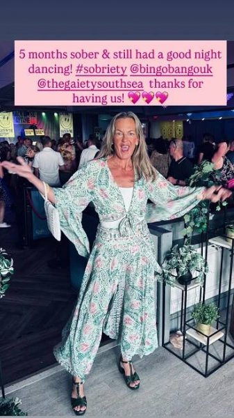 Lorraine Stanley at a nightclub, celebrating 5 months of sobriety.