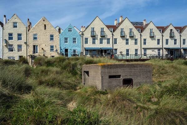 This quiet British island was once the site of Nazi atrocities. A new inquiry reveals its truths
