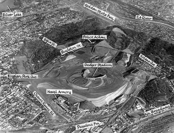 January 3, 1962: "Construction of the $16,000,000 Dodger Stadium in Chavez Ravine is slightly ahead of schedule and the new home of the Dodgers will be ready for season opening on April 10. The stadium will have 49,000 seats in the grandstands and an additional 7,000 seats in centerfield pavilion area." Courtesy of the Los Angeles Public Library