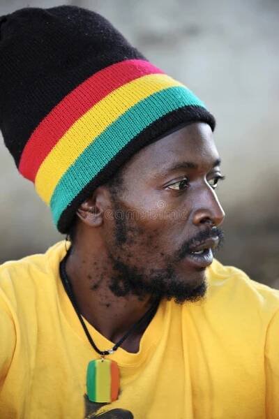 Portrait of young rasta man in traditional clothes. Black dreadlocks stock images, royalty-free photos and pictures