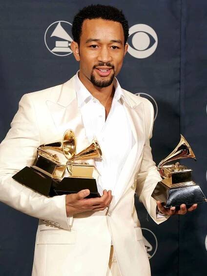 John Legend poses in the press room at the 48th annual Grammy Awards in L.A. on Feb. 8, 2006