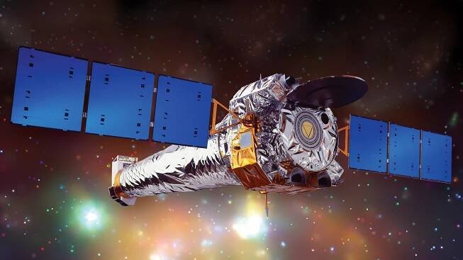 illustration of a telescope with solar panels outstretched. a colorful gas cloud is in the background