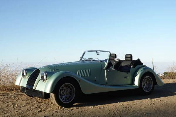 A Morgan Plus Four seen from the front 3/4s