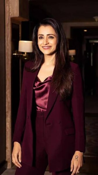 Trisha Krishnan redefines power dressing in a stunning burgundy pantsuit