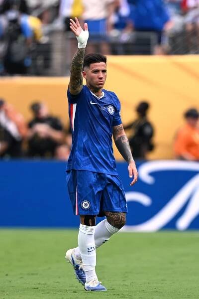 Enzo Fernandez of Chelsea FC waving to fans.