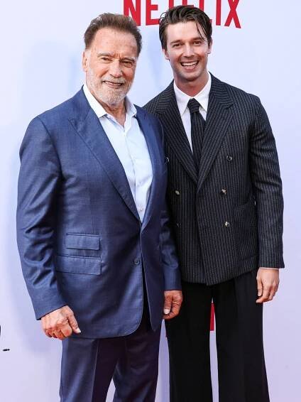 Arnold and Patrick Schwarzenegger at red carpet
