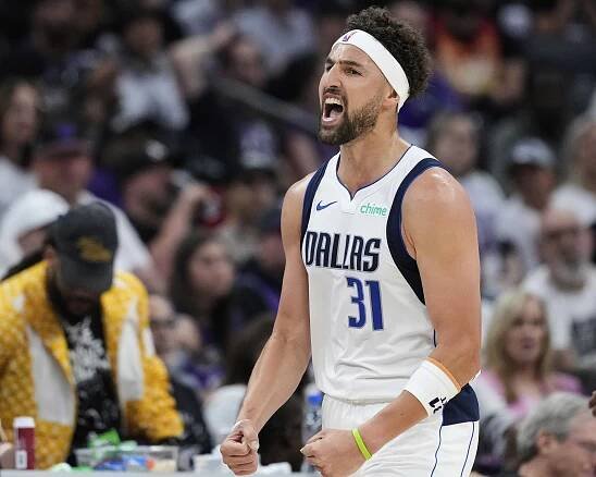 Klay Thompson, who scored 23 points, celebrates during the Mavericks' 120-106 play-in win over the Kings on April 16, 2025. 