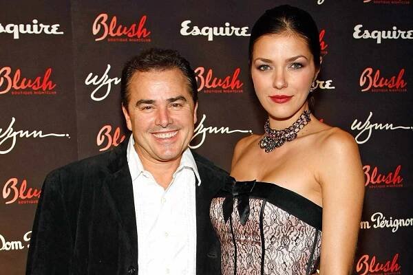 Actor Christopher Knight (L) and his wife, model Adrianne Curry, arrive at the anniversary party for the Blush Boutique Nightclub inside the Wynn Las Vegas October 18, 2008 in Las Vegas, Nevada. 
