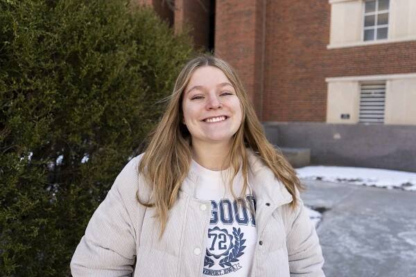 First-year student Josie Babcock poses for a portrait in Iowa City, on Feb. 22. Babock is studying English and creative writing at the University of Iowa with hopes of becoming a teacher in the future.
