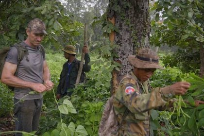 Mr Ben Davis (left) on a snare patrol with Cambodian rangers at Cambodia’s Phnom Tnout Wildlife Sanctuary. ST PHOTO: MARK CHEONG