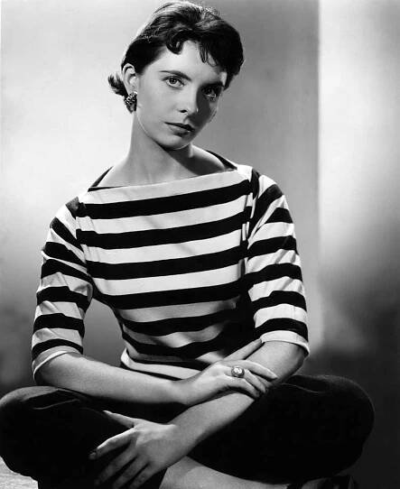 Actress Margaret O'Brien in striped shirt and black pants