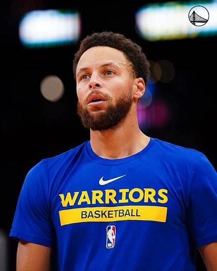Steph Curry Wearing Blue Warriors T-Shirt Wallpaper