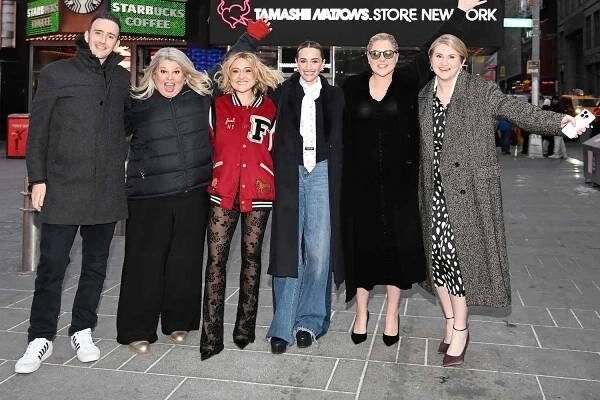 Tyler Spindel, Urzila Carlson, Lizze Broadway, Brianne Howey, Amy Schumer and Jillian Bell pose with KINDA PREGNANT billboard in Times Square on January 30, 2025 in New York City