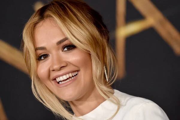 Rita Ora in Bathing Suit Says “Happy Sunday Love You”