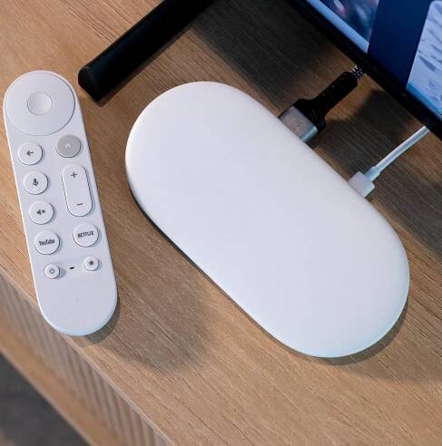 A hands-on photo of the Google TV Streamer set-top box.