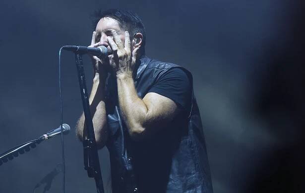 Trent Reznor of Nine Inch Nails performs