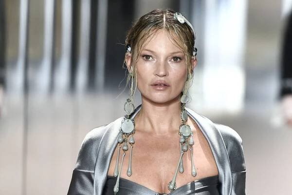 Kate Moss, seen here walking the runway in January 2021