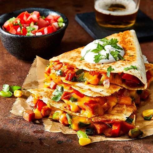 mid angle looking at a few andouille and poblano quesadillas