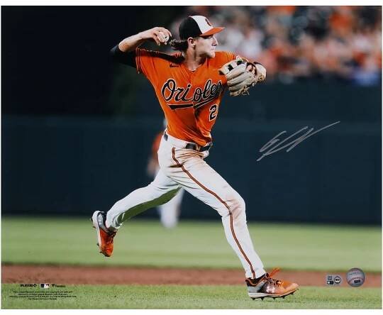 Gunnar Henderson Baltimore Orioles Autographed Fanatics Authentic 16" x 20" Orange Jersey Throwing Photograph