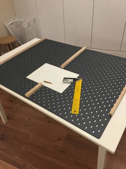 attach plywood rail in this ikea skadis hack 