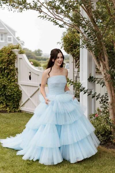 Bride Holding Tulle Tiered Skirt of Strapless Blue Wedding Dress