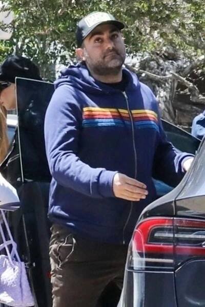 Lady Gaga is spotted at Soho House for a casual Easter Sunday lunch alongside fiancée Michael Polansky and her mom, following her Friday night Coachella performance. She makes a bold fashion statement in an oversized leather jacket, thigh-high socks, and towering platform heels.