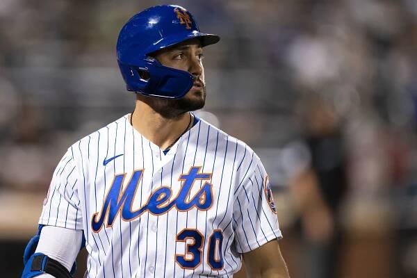 New York Mets’ Michael Conforto (30) lines out in the fourth inning of an MLB game against the Philadelphia Phillies, Sunday, Sept. 19, 2021, in Queens, NY.