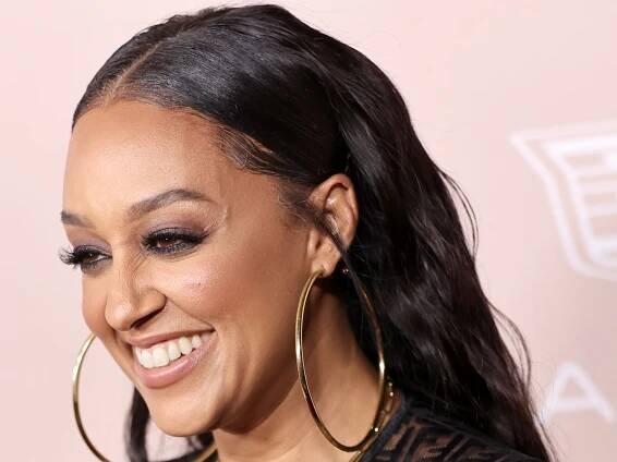 Tia Mowry Is Wearing What I Can Only Describe as a Fairy Princess Ponytail — See Photos