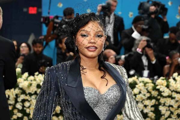 Halle Bailey Glams Up for 2025 Met Gala in Mini Suit-Dress with Black Beaded Veil