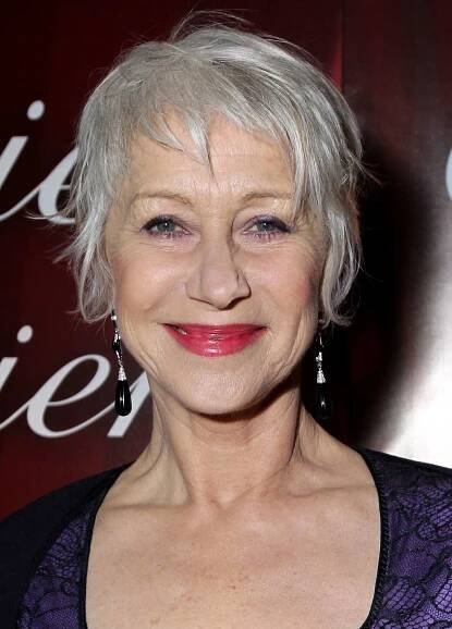 Elegant Helen Mirren Sporting a Silver Hairstyle Wallpaper