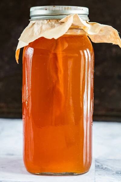 A pellicle forming in kombucha tea, day 7.