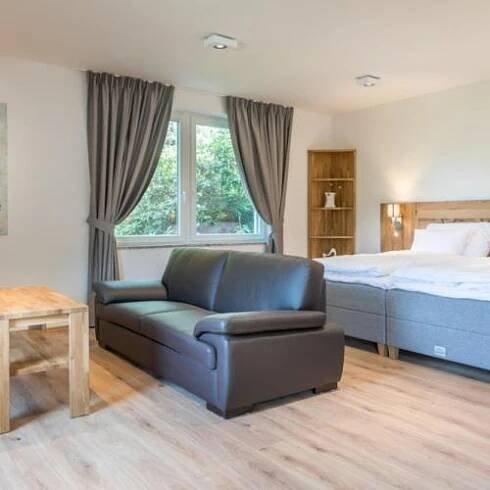 Postel nebo postele na pokoji v ubytování Resort CATTALEYA