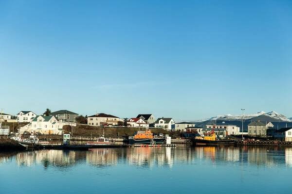 a coastal town viewed from the sea