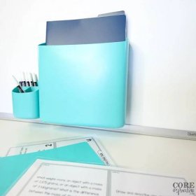 Plastic folder with word problem solving task cards placed inside a magnetic bin that is attached to a whiteboard is a sleek space-saving approach to storing task cards.