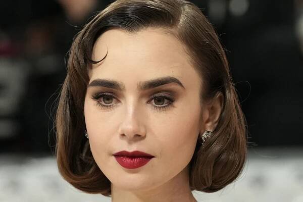 Lily Collins Somehow Managed to Make Milkmaid Braids Goth — See Photo