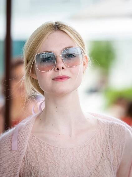 Image may contain Blonde Girl Human Female Teen Kid Person Woman Child Sunglasses Accessories and Accessory