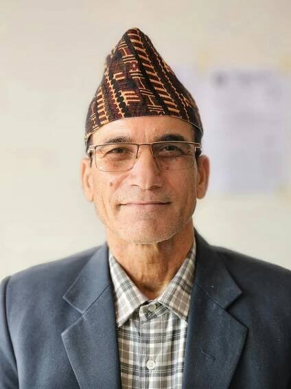 Free Portrait of an elderly man in glasses and traditional cap, exuding wisdom and warmth. Stock Photo