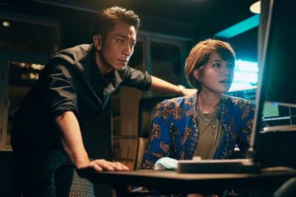 Ron Ng (left) as ICAC chief investigation officer Lok Yat-fung and Chloe So as a computer hacker in a still from “Crypto Storm”.
