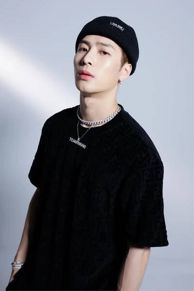 Image may contain Clothing Apparel Human Person Sleeve Pendant Long Sleeve Necklace Jewelry and Accessories