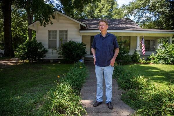 “House of horrors,” Scott Shepherd murmured as he parkedin front of the small, white home where he grew up with four siblings, his mother and abusive father.  “It was very violent. My dad would come home in drunken rages and take a butcher knife and cut mattresses up ... there wouldn't be any furniture staying in upright.” Seeking the love and support he didn’t get from his own father, Shepherd said, he would have joined any group, even ISIS. (Shelby Knowles/News21)
