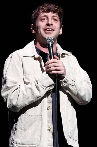Alex Edelman performs onstage during the 2025 Night of Too Many Stars on March 31, 2025 in New York City.
