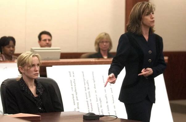 Prosecutor Kelly Siegler, right, points towards defendent Susan Wright, left, during closing arguments in her murder trial, Tuesday, March 2, 2004, in Houston. On trial for stabbing her husband 193 times, Wright testified she killed her husband only after he raped her and threatened her with a butcher knife. (AP Photo/Pat Sullivan)