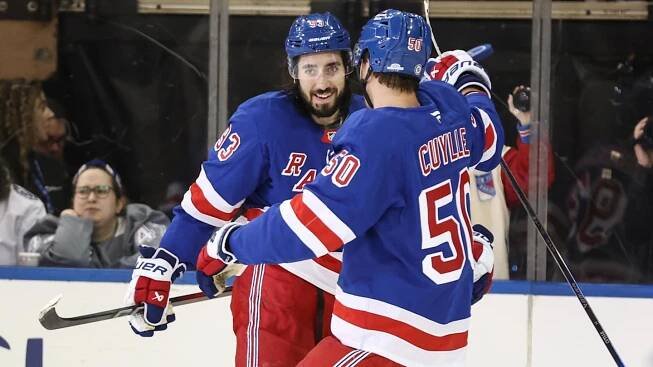 Apr 17, 2025; New York, New York, USA;  New York Rangers center Mika Zibanejad (93) celebrates with left wing Will Cuylle (50) after scoring a goal in the third period against the Tampa Bay Lightning at Madison Square Garden. Mandatory Credit: Wendell Cruz-Imagn Images